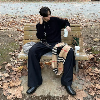 Wide-leg slacks with side pleats