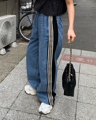 Triple side-stripe cutoff denim pants