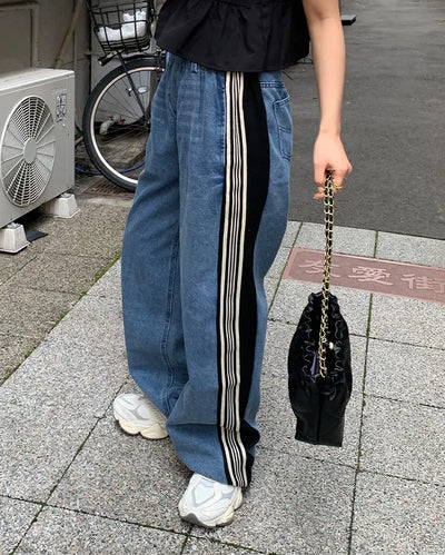 Triple side-stripe cutoff denim pants