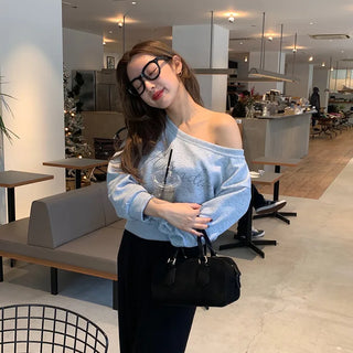 Cubic lettering off-shoulder sweatshirt