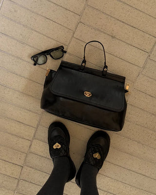 Gold button shoulder bag