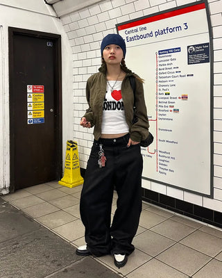 Coated black baggy denim pants