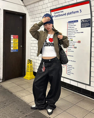 Coated black baggy denim pants