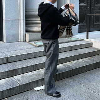 Wide-leg slacks with side pleats