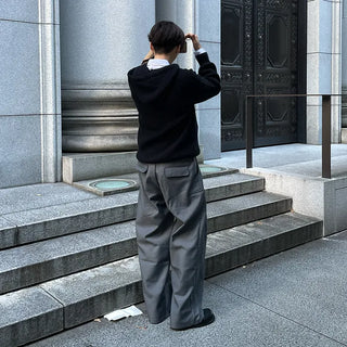 Wide-leg slacks with side pleats
