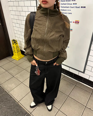 Coated black baggy denim pants
