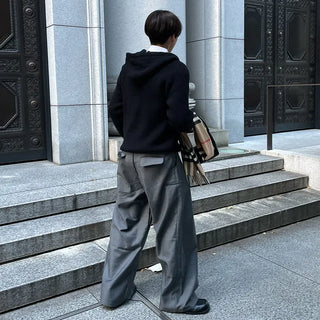 Wide-leg slacks with side pleats
