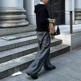 Wide-leg slacks with side pleats