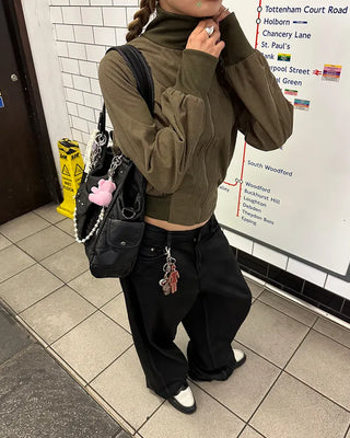 Coated black baggy denim pants