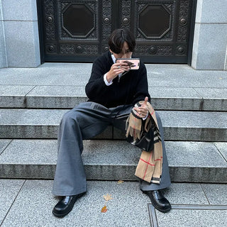 Wide-leg slacks with side pleats