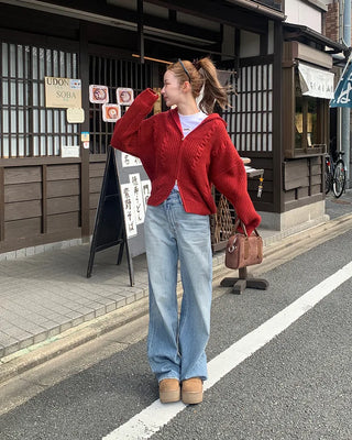 Cable knit high neck half-zip sweater