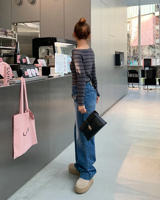 Asymmetrical striped knit