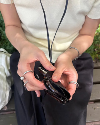 Half-moon leather eyeglass holder