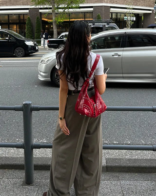 Pinstripe center-pleated wide-leg slacks