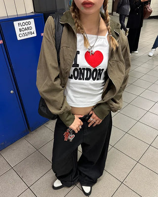 Coated black baggy denim pants