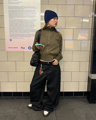 Coated black baggy denim pants
