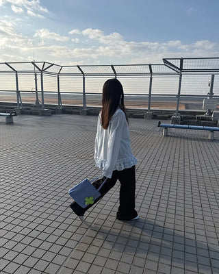Two-pleat, center-creased wide-leg slacks