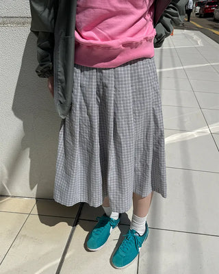 Checked pleated midi skirt