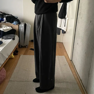Wide-leg slacks with double pleats