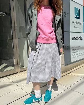 Checked pleated midi skirt