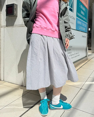Checked pleated midi skirt