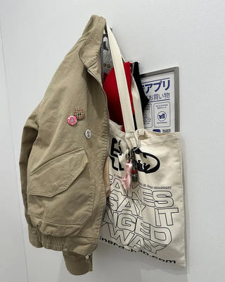 Stand-neck flap double-zip blouson