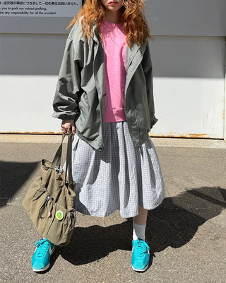 Checked pleated midi skirt