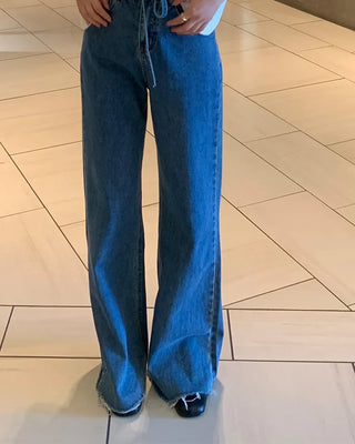Strap high-waisted denim pants