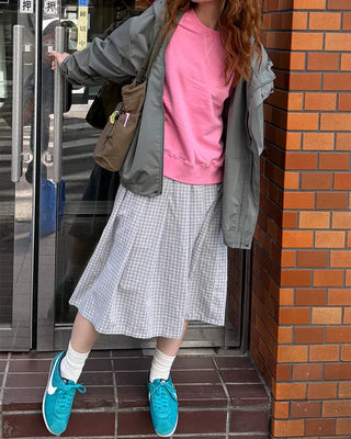 Checked pleated midi skirt