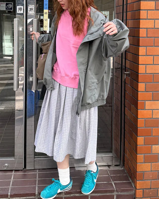 Checked pleated midi skirt