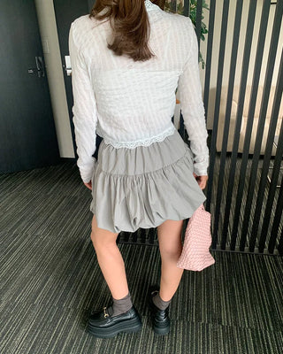 Belted voluminous mini skirt