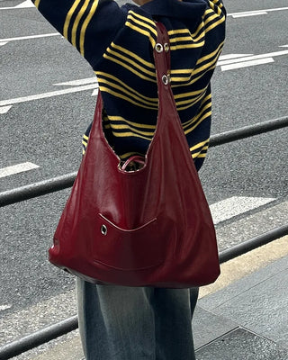 Leather leopard reversible eyelet one-shoulder bag