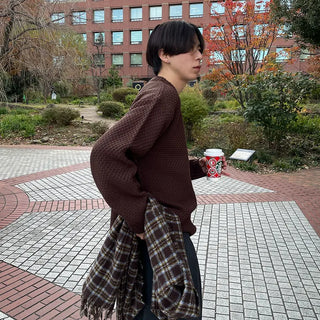 Round punched knit sweater