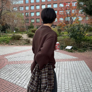 Round punched knit sweater