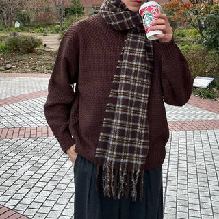Round punched knit sweater