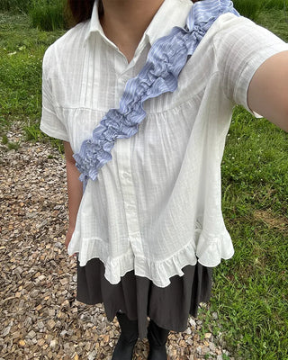 Striped half-moon shirred bag