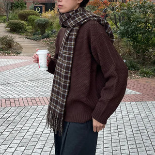 Round punched knit sweater
