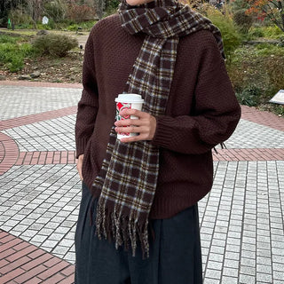 Round punched knit sweater