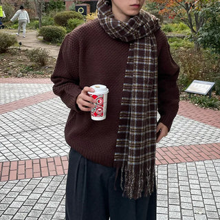 Round punched knit sweater