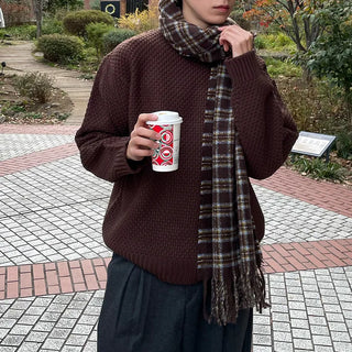 Round punched knit sweater