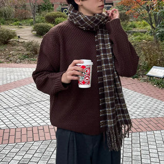 Round punched knit sweater