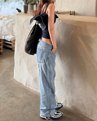 Back lettering denim pants