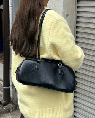 Oval long shoulder bag
