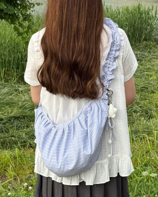 Striped half-moon shirred bag