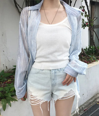 Distressed denim shorts