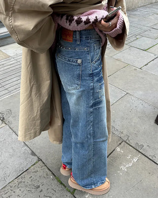 Mixed stud deep whisker wash denim pants