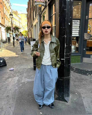Black button-up elastic waist parachute pants
