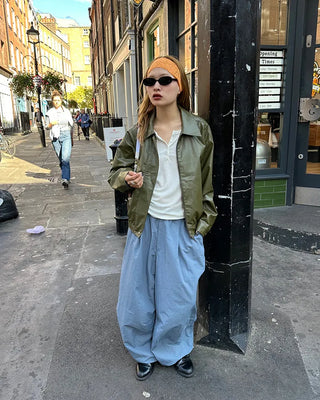 Black button-up elastic waist parachute pants