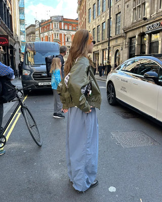 Black button-up elastic waist parachute pants
