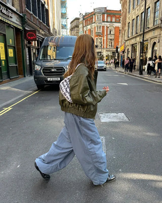 Black button-up elastic waist parachute pants